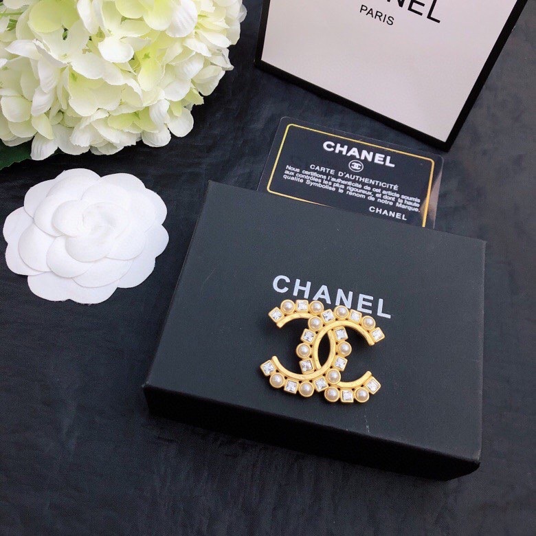 Ch*el brooches